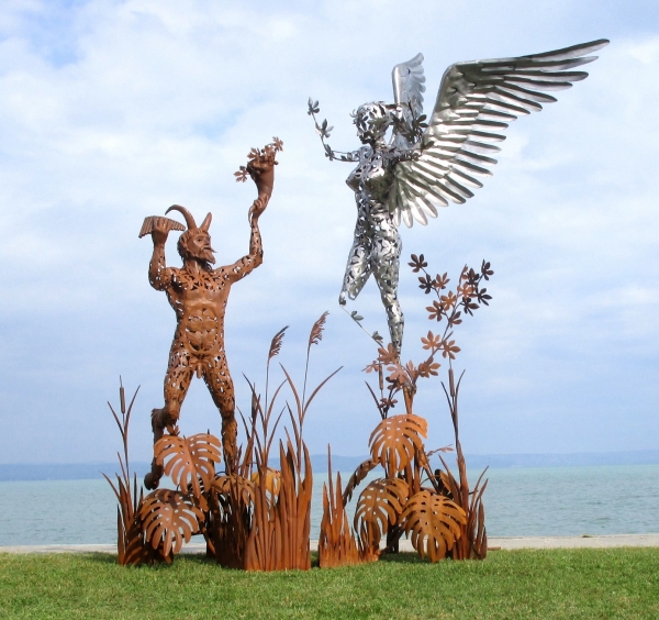 Pan and Syrinx garden sculpture rusty